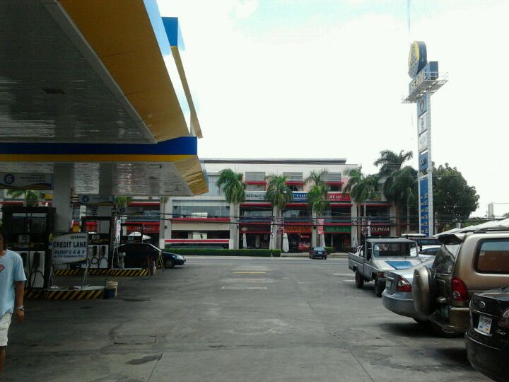 Total Gas Station and Ford Dealership